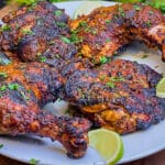 plate of pollo asado dressed with cilantro