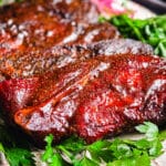 smoked pork steaks on a platter