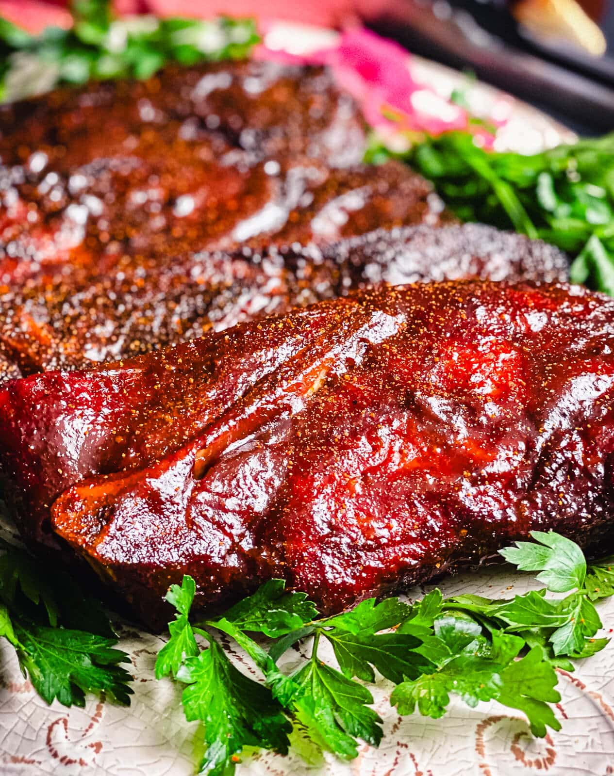 smoked pork steaks on a platter