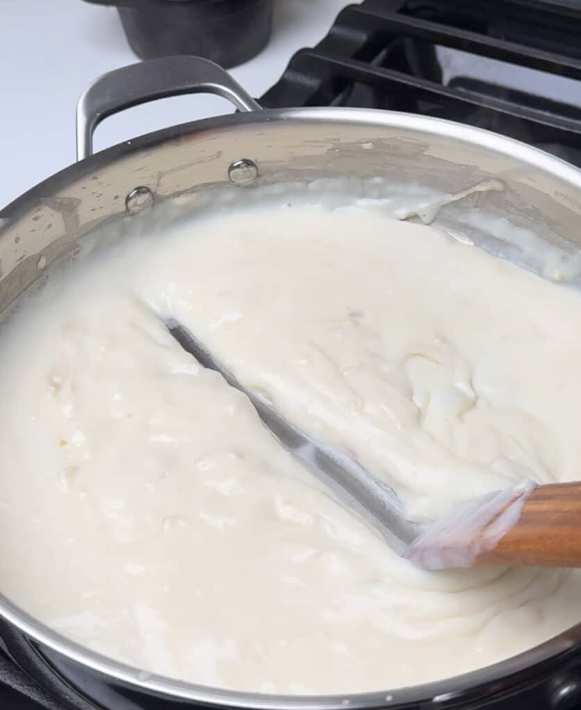 thick cream sauce in a pan