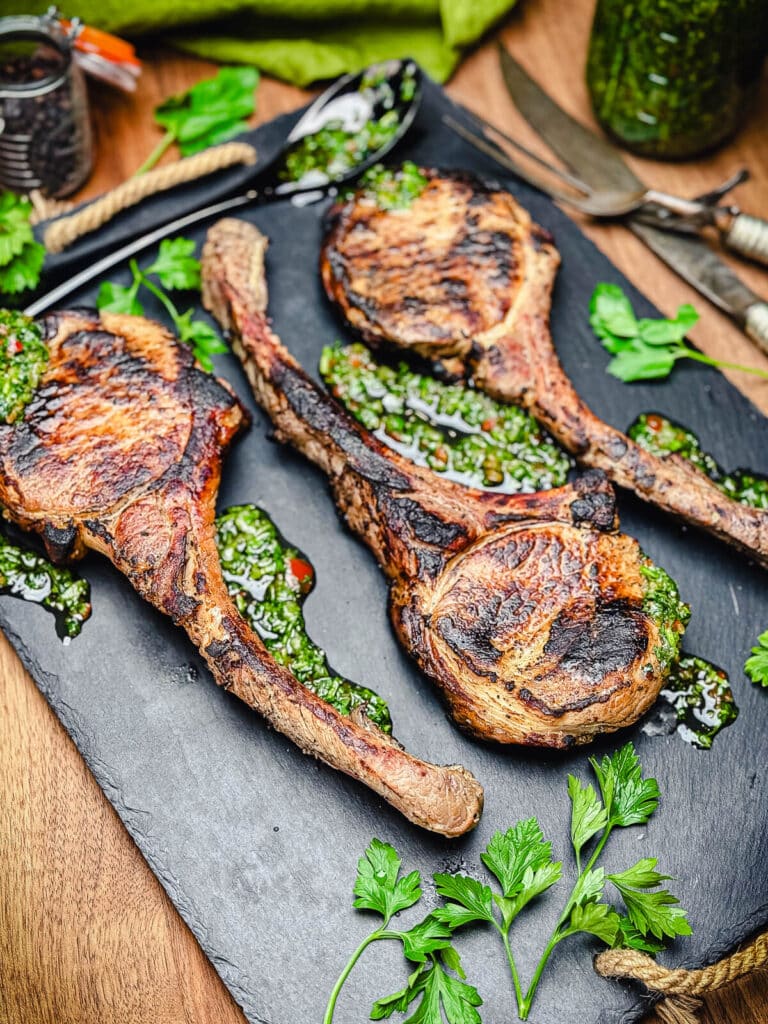 grilled pork chops on a platter