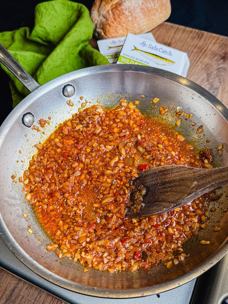 onions cooking in oil in a skillet