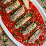 sardines fra diavolo on a white platter