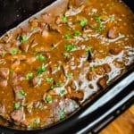 crockpot beef tips topped with parsley