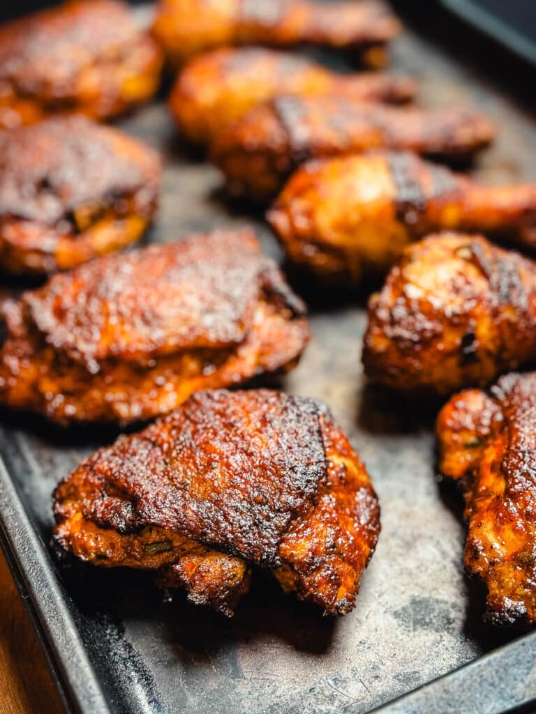 grilled peruvian chicken on a baking sheet