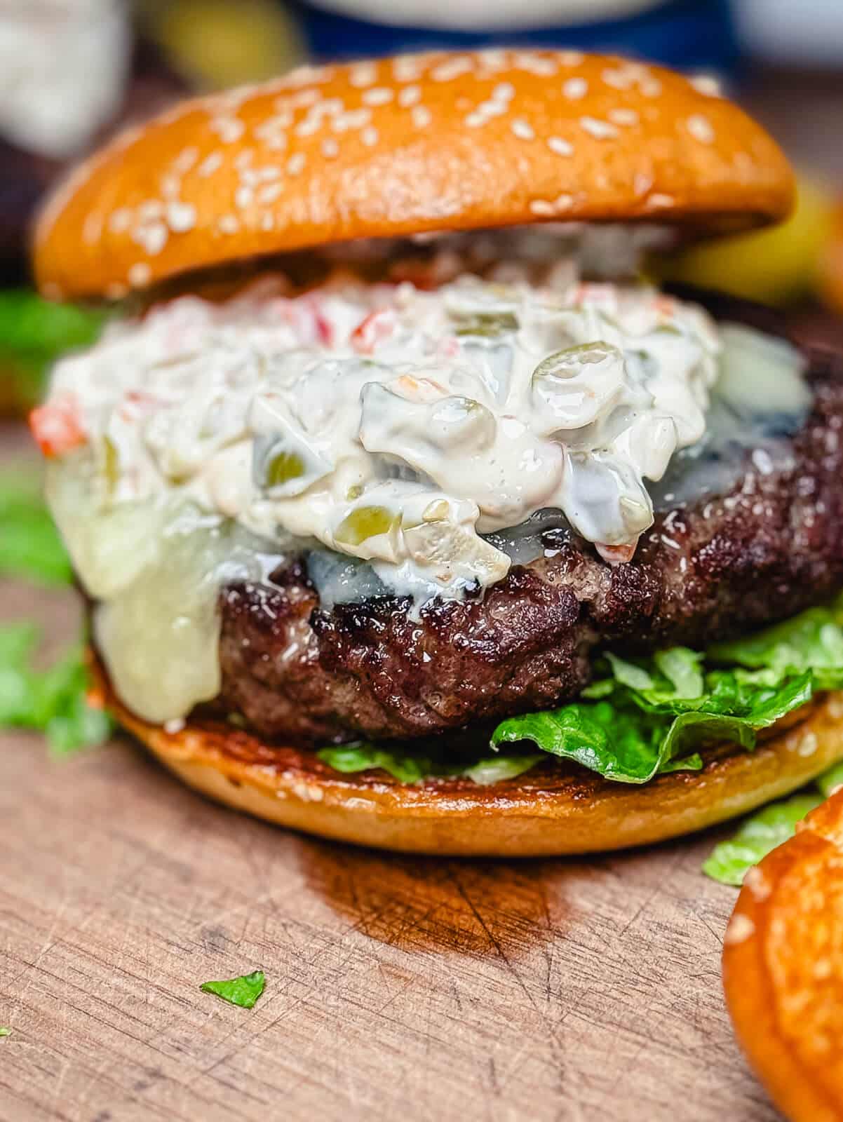 Michigan olive burger with melted swiss cheese on the patty