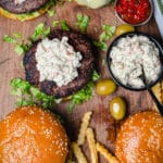 Michigan olive burgers on a platter with french fries