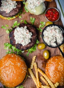 Michigan olive burgers on a platter with french fries