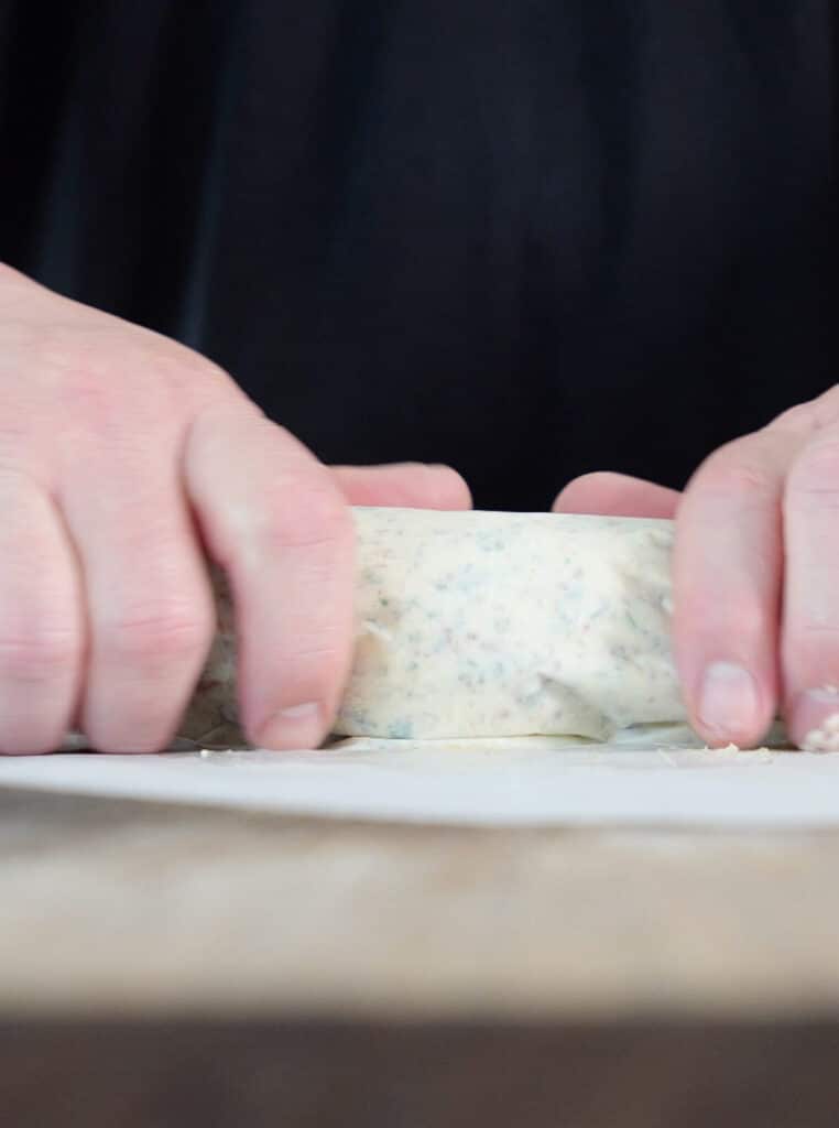butter rolled up in parchment paper