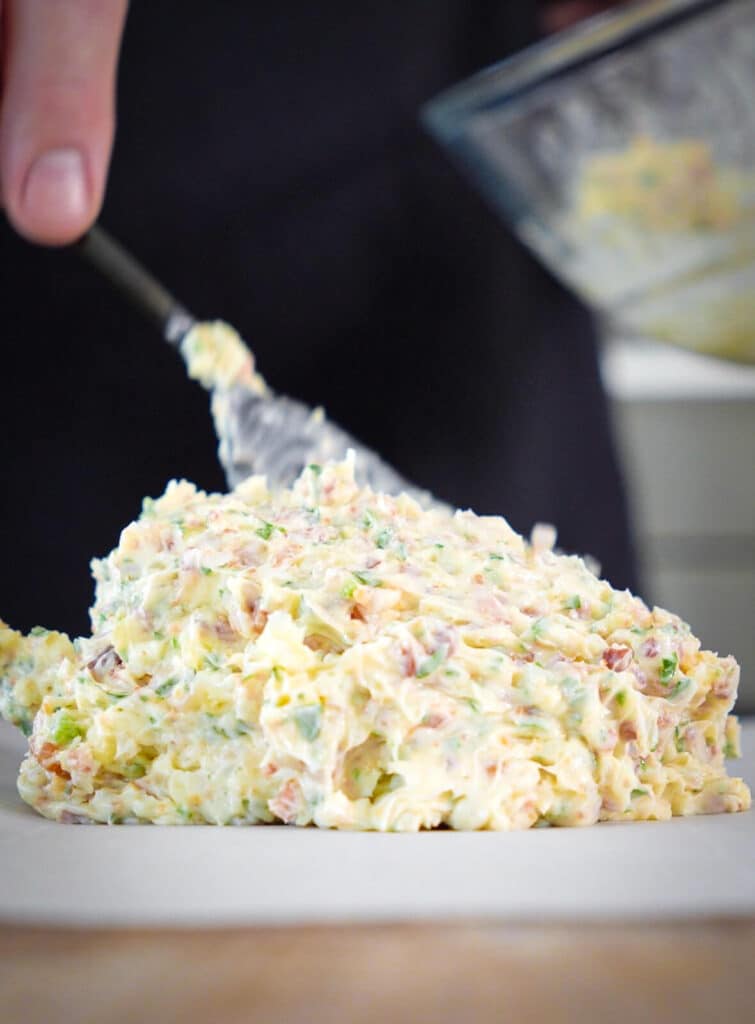 mound of bacon butter on a sheet of parchment paper