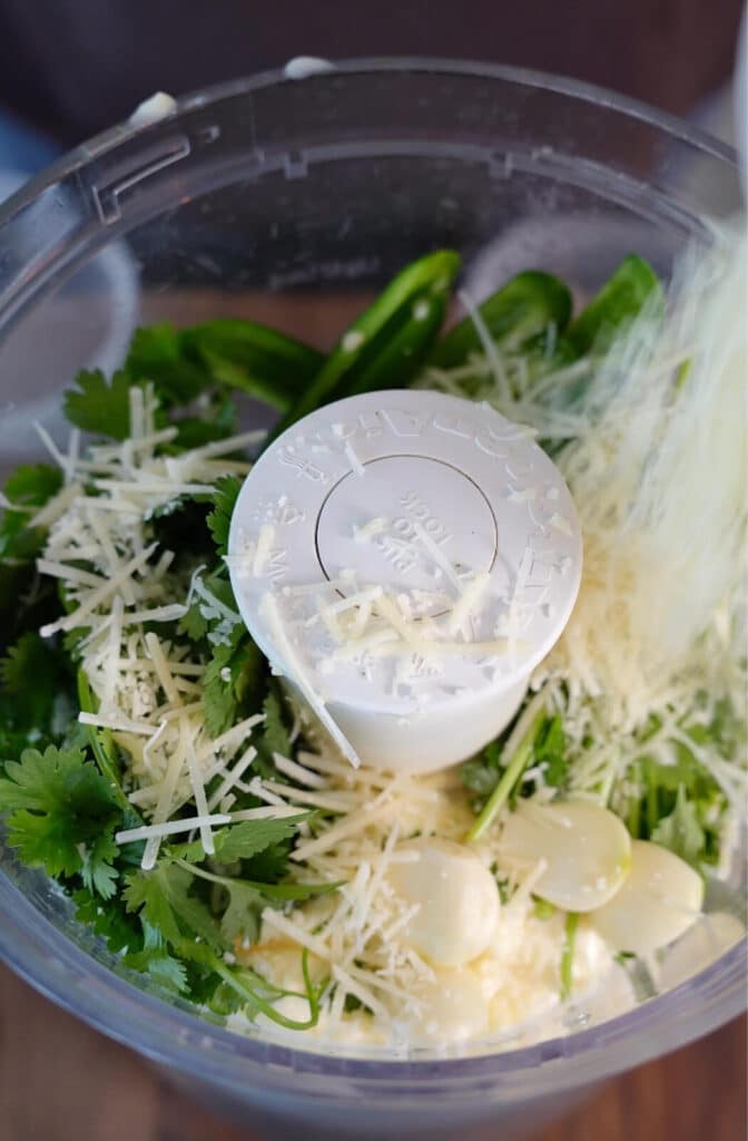 ingredients for aji verde in a food processor