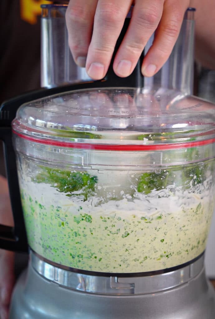 aji verde sauce being blended in a food processor