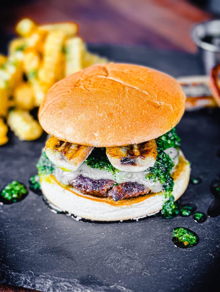 columbian burger with bananas and chimichurri