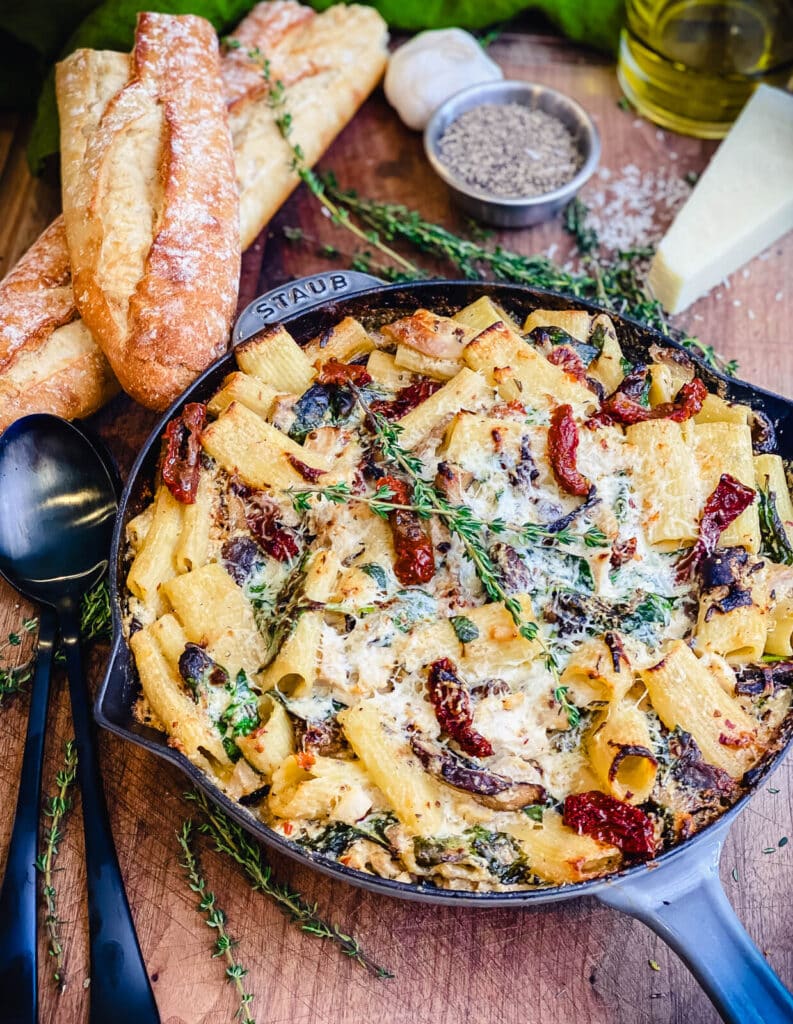 Creamy chicken pasta bake in skillet