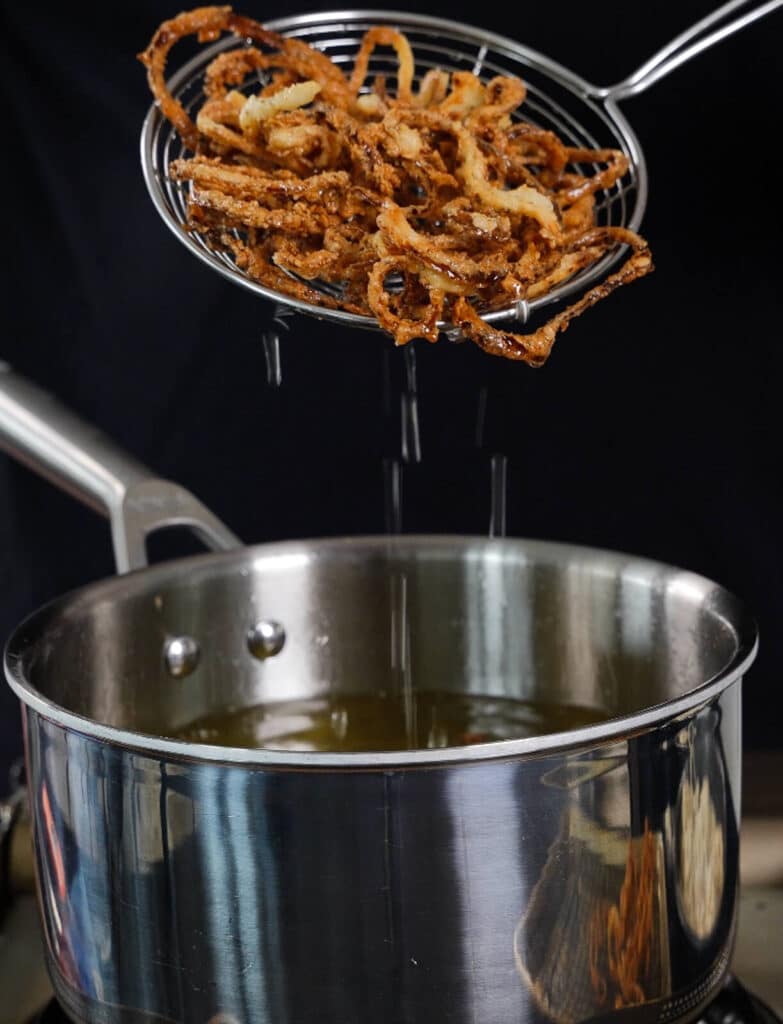 fried onions coming out of oil
