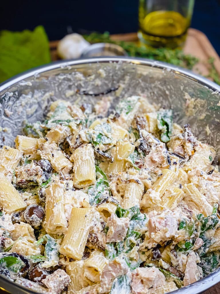 pasta bake ingredients in a large mixing bowl