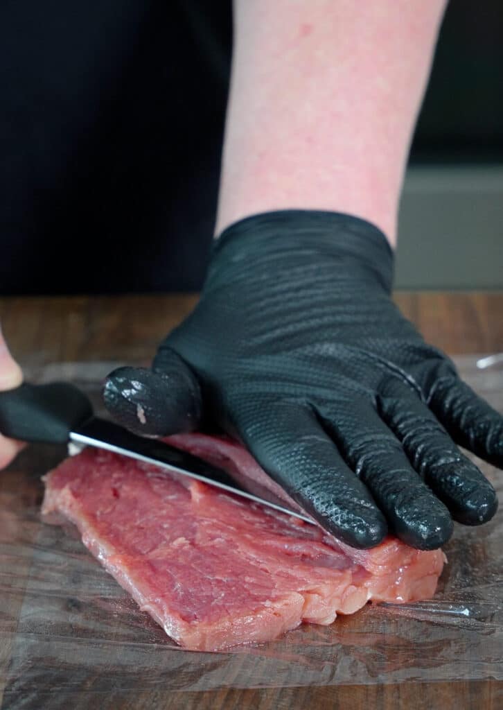 pork tenderloin being butterflied