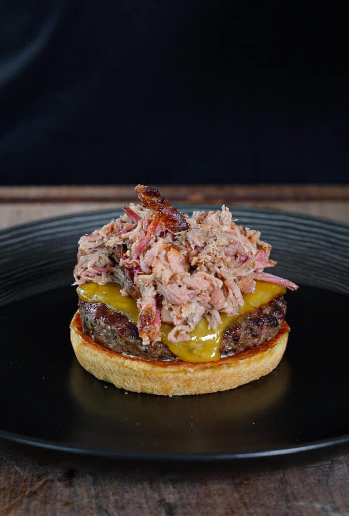 pulled pork added to a bbq pulled pork burger