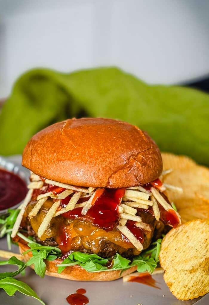 Up North burger on a plate with cherry bbq sauce