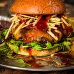 bbq venison cheese burger with shoe string potatoes
