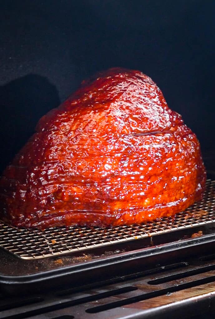 glazed double smoked ham in a smoker