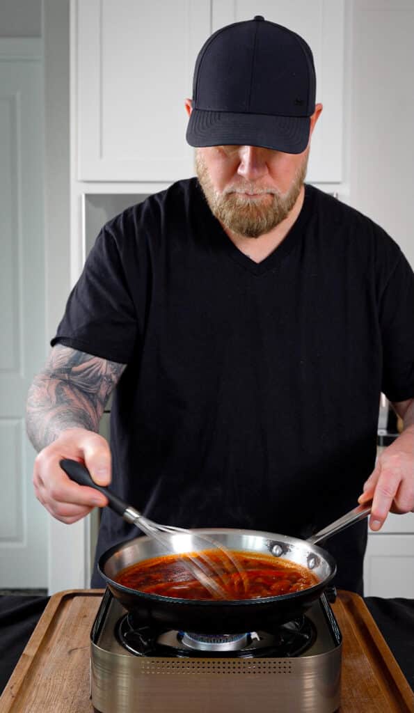 ham glaze being heated in skillet