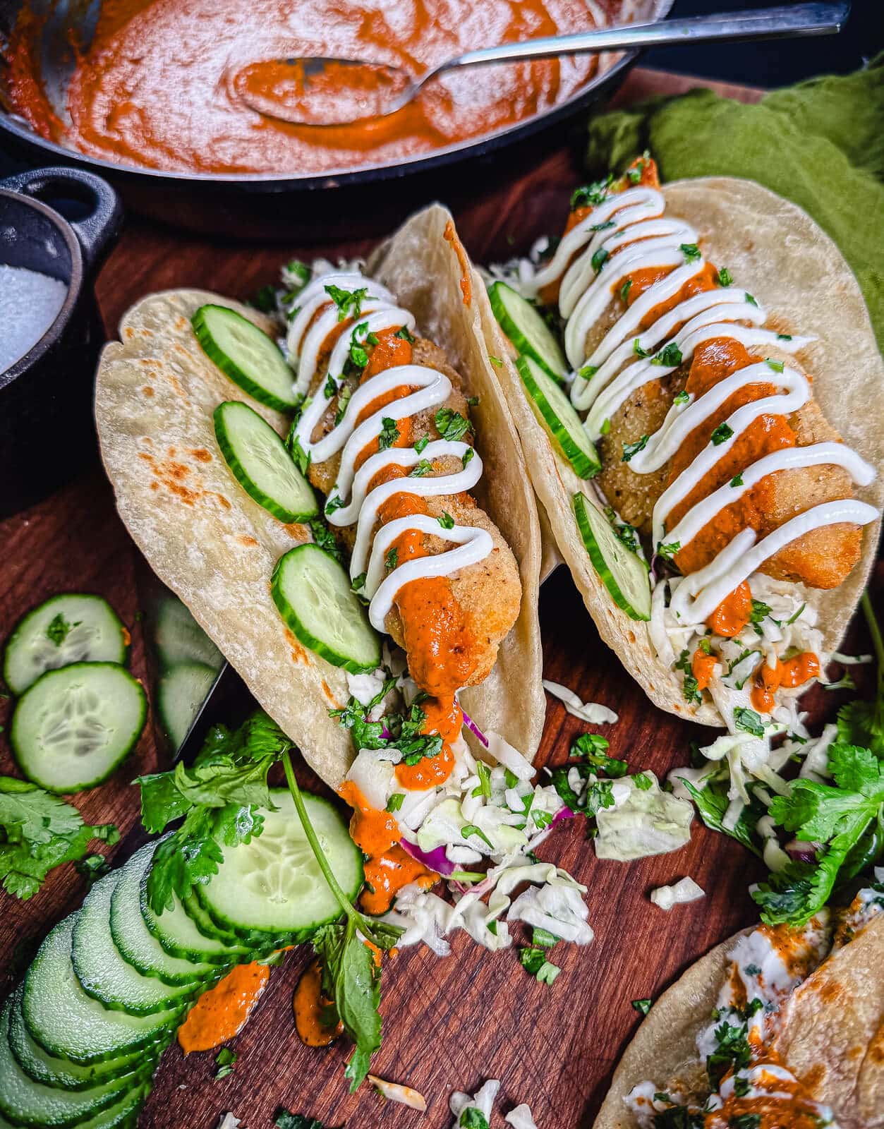 tikka masala tacos with cucumbers and slaw