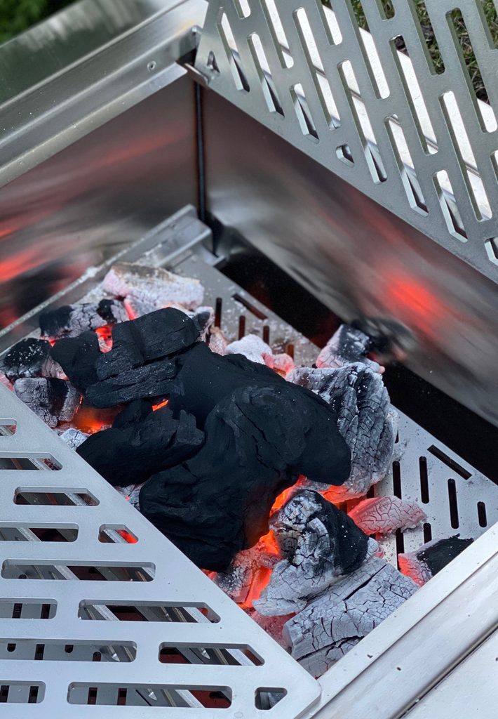 burning down and ashing over in a grill